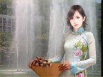 áo dài ôm nón đựng hoa sen trước bồn phun nước